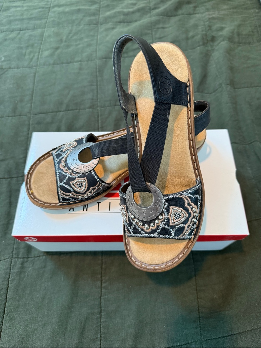 Rieker Black Embroidered Slingback Sandals with Metallic Medallion